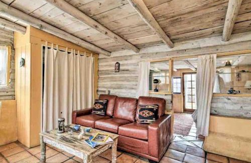 San Cristobal Casa | Log Casita Overlooking Pond and Waterfall near Taos, New Mexico