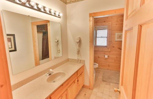 Gatlinburg Casa | Log Inn, 5 bed 3 bath group cabin in Gatlinburg with game room and hot tub, seasonal resort pool