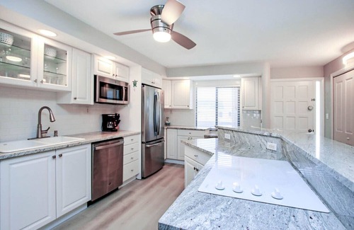 Sanibel Casa | Piscina climatizada, canchas de tenis, barbacoa, WiFi y más.