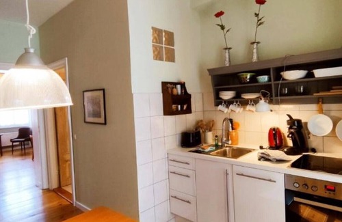 Rheinsberg Condominio | LoggiaHaus am Schloss, apartment Pünktchen, 1st floor, loggia Partly furnished. Castle view