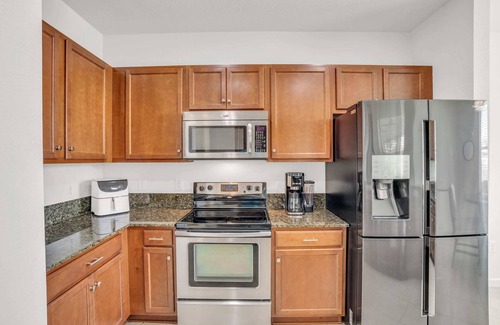 Bonita Springs Condominio | Long Lake View From This First Floor Coach Home