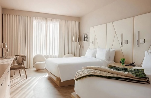 Florida Central Atlantic Coast Hotel | Look No Further! 2 Exquisite Units, w/ Outdoor Pool, Shuttle Service, Parking!