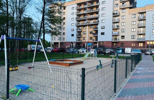 Ostroleka Apartamento | Lotus apartments NaturaApart garaż
