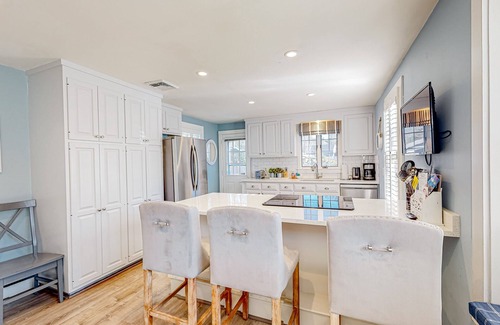 Cotuit Casa | Lovell's Pond Retreat - remodeled home with sunroom, steps to secluded pond