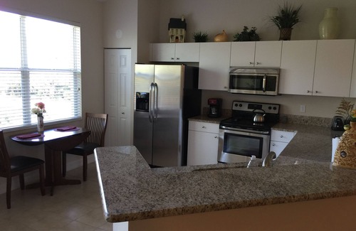 Estero Condominio | Lovely 2-bedroom condo in Pelican Sound Golf and Country club , Estero Fl .