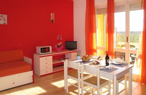 Luni Mare Apartamento | Acogedor apartamento con A/C, WIFI, piscina, TV, balcón, mascotas permitida y aparcamiento