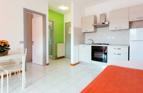 Luni Mare Apartamento | Acogedor apartamento con A/C, WIFI, piscina, TV, balcón, mascotas permitida y aparcamiento