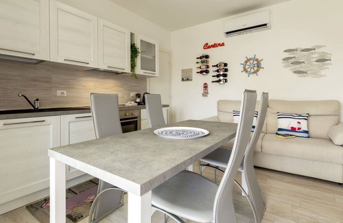 La Muddizza Apartamento | Bonito apartamento para 5 personas con piscina, A/C, WIFI, TV, terraza y aparcamiento