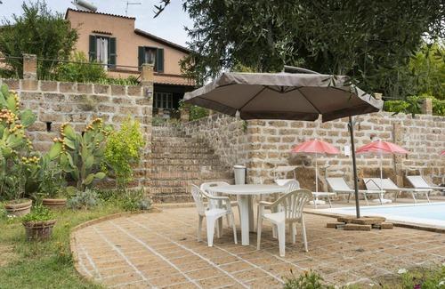 Corchiano Apartamento | Hermoso apartamento para 8 personas con WIFI, piscina, TV, patio, mascotas permitida y aparcamiento