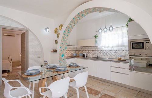 Eden Beach Villa | Bonito apartamento en villa con WIFI, piscina, A/C, TV, patio y mascotas permitida