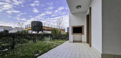 Bibione Lido del Sole Apartamento | Lovely apartment overlooking the pool in Bibione