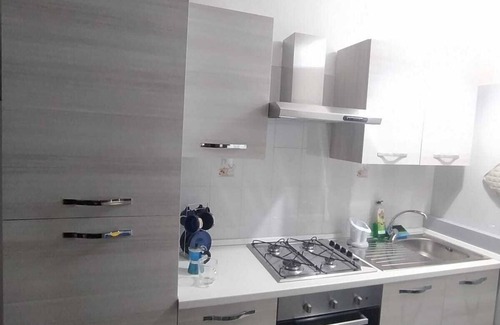 Muro Lucano Apartamento | Lovely apartment with fireplace and parking