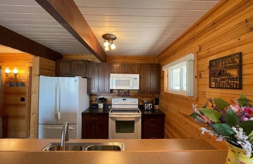 Cheboygan Casa | Lovely Chalet Home on Quiet Bay with Sandy Beach