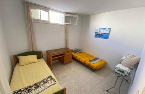 Hiboun Apartamento | Lovely garden-level near Beach