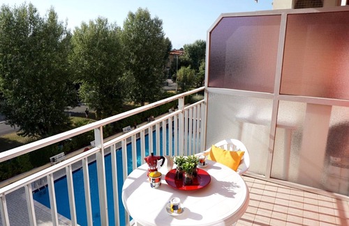 Porto Santa Margherita Apartamento | Precioso piso con balcón y piscina compartida.