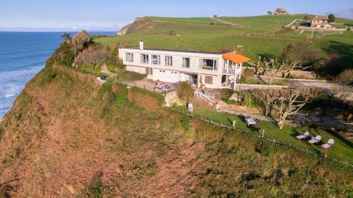 Alfoz de Lloredo Casa | Luaña Beach House
