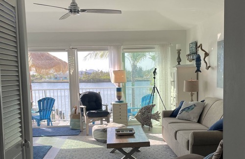 Treasure Cay Condominio | Lucky Dog's Bird House - Upper Condo - includes a 36' boat slip & a golf cart!