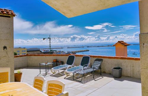 Aguino Apartamento | Lujo y vistas panorámicas en primera línea de mar