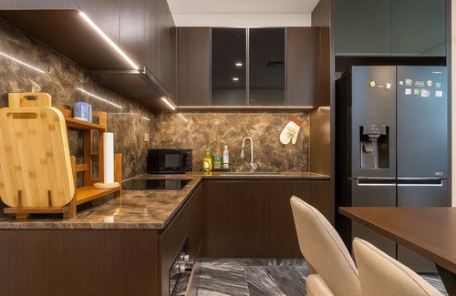 District 9 Apartamento | Lumière Riverside by Urban Home