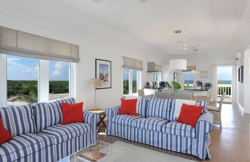 James Cistern Condominio | Ático nuevo con Htd. Piscina, muelle, playa privada, vista al mar, kayaks, carrito de golf