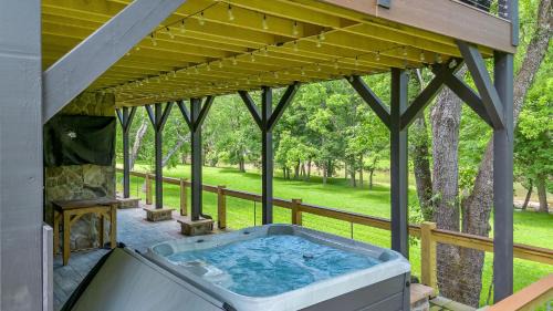 Lansing Casa | Lux Riverfront Retreat- Hot Tub, Game Room, Views!