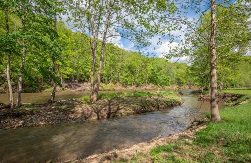 Lansing Casa | Lux Riverfront Retreat- Hot Tub, Game Room, Views!