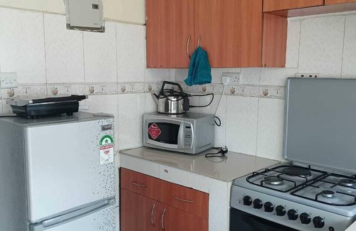 Nairobi Apartamento | Lux Suites MacDade Apartments