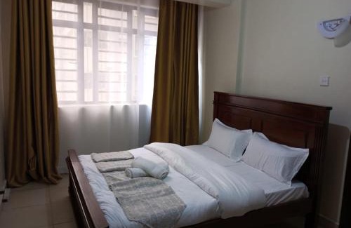 Mbotela Apartamento | Lux Suites Wawazi Court Apartments