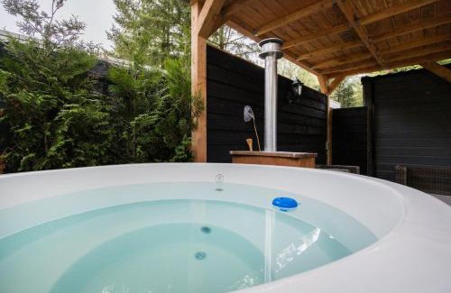 Bosgebied Hoenderloo Chalet De Esquí | Luxe Chalet Veluwe Sauna en Hottub