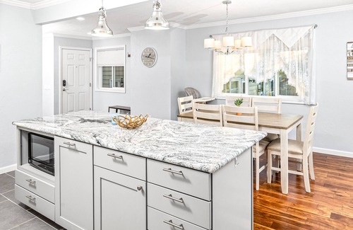 Tudor Area Casa | Luxe mountain-view escape - 2 condos w/4 fireplaces, deck, hot tub + dogs okay