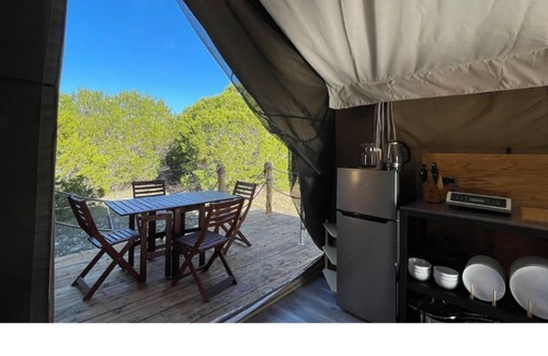 Kempner Cabina | Luxe safari tent + river & exotic wildlife