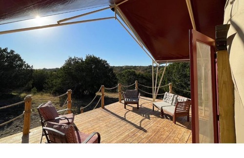 Kempner Cabina | Luxe safari tent + river & exotic wildlife