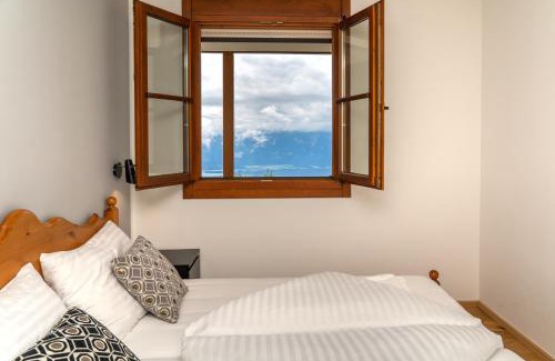 Kanzelhohe Apartamento | Luxescape-Traumaussicht-Wandergebiet-Paragleiten-Mountainbiken-Erlebnis CARD