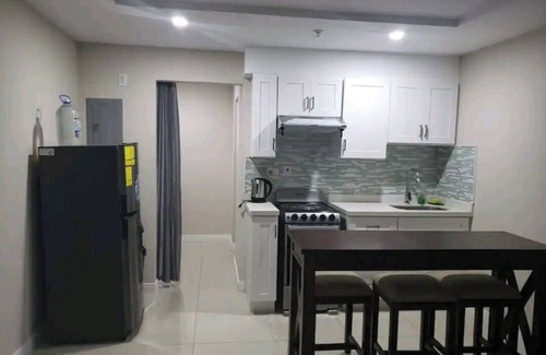 Portmore Apartamento | Luxuriate poolside or on the private beach at this comfy studio apartment.
