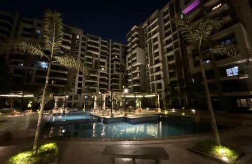 Nasr City Apartamento | Luxurious 2-Bedroom Apartment in Primera Compound with Scenic Pool Views