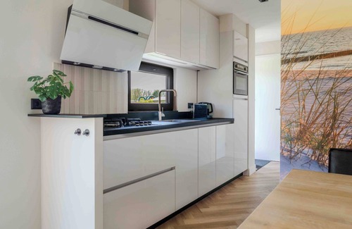 Sint Kruis Chalet De Esquí | Luxurious 5-person chalet in Zeeuws-Vlaanderen - Large garden - Air conditioning