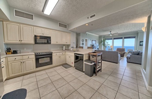 Thomas Drive Condominio | Luxurious Beachfront Condo with Beachside Pool Access and Free WiFi - Unit 1202 by RedAwning