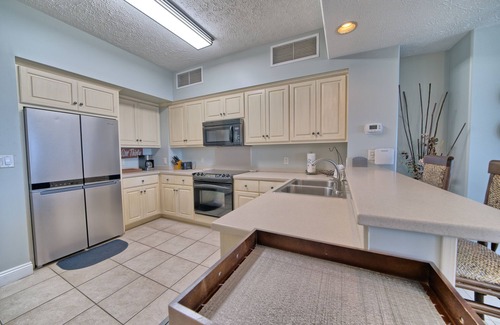 Thomas Drive Condominio | Luxurious Beachfront Condo with Beachside Pool Access and Free WiFi - Unit 1202 by RedAwning