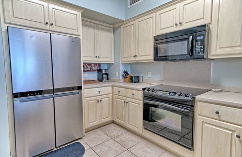 Thomas Drive Condominio | Luxurious Beachfront Condo with Beachside Pool Access and Free WiFi - Unit 1202 by RedAwning