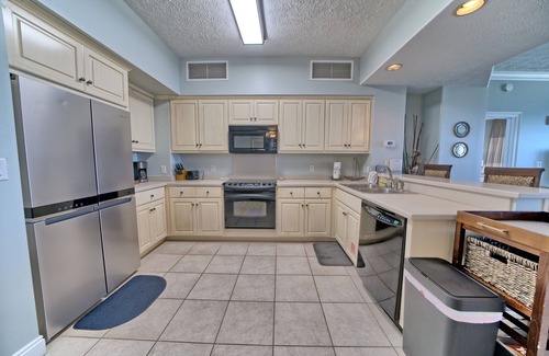 Thomas Drive Condominio | Luxurious Beachfront Condo with Beachside Pool Access and Free WiFi - Unit 1202 by RedAwning