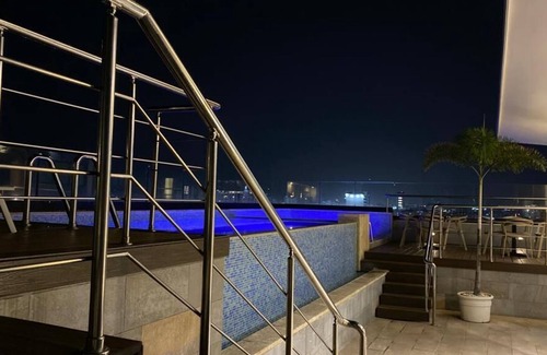 Ensanche Quisqueya Apartamento | Luxurious Downtown Apt, Rooftop Pool, Gym
