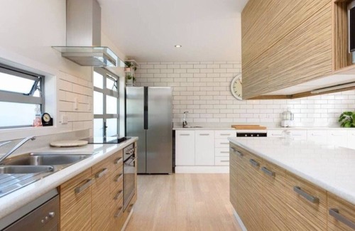 Papamoa Beach Casa | Luxurious modern Beach Getaway with spa pool. Only 150m to white sandy beach