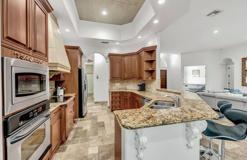 Bay Isle Casa | Luxurious Paradise with Tiki Bar and Heated Pool, Just Remodeled!