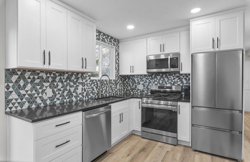 Sandy Casa | Luxurious Renovated Home with New Hot Tub: By Stadium, Expo Center, and Skiing.