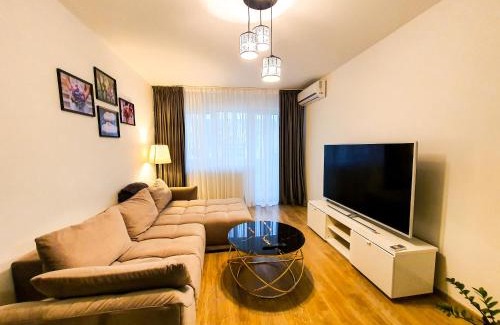 Popesti-Leordeni Apartamento | Luxurious Retreat 1BR Apartment with Netflix, Private Parking and self check in