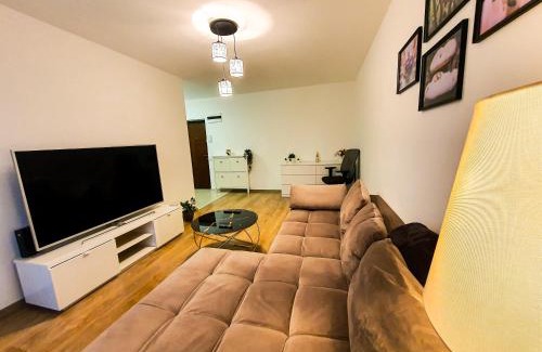 Popesti-Leordeni Apartamento | Luxurious Retreat 1BR Apartment with Netflix, Private Parking and self check in