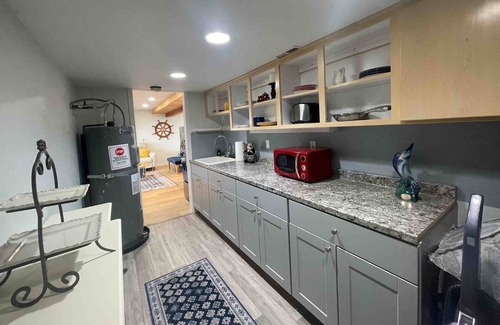Hansville Casa | Luxurious water view home with private hot tub surrounded by wildlife