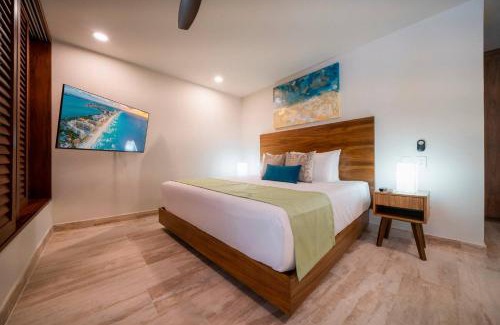 Playacar Casa | Luxury 2 Bedroom Condo - Infinity Pool at AWA Residences in Playacar, AWA 107
