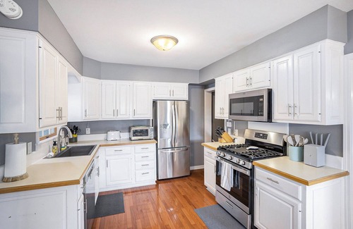 Linden Casa | Luxury 3 bedroom waterfront home with indoor hot tub, sauna, paddle boat & kayak