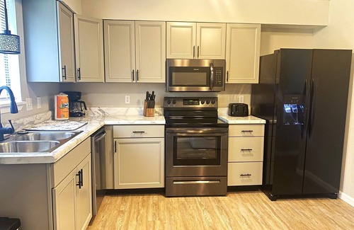 Pineville Condominio | Luxury 4 bedroom Villa 103 with river access